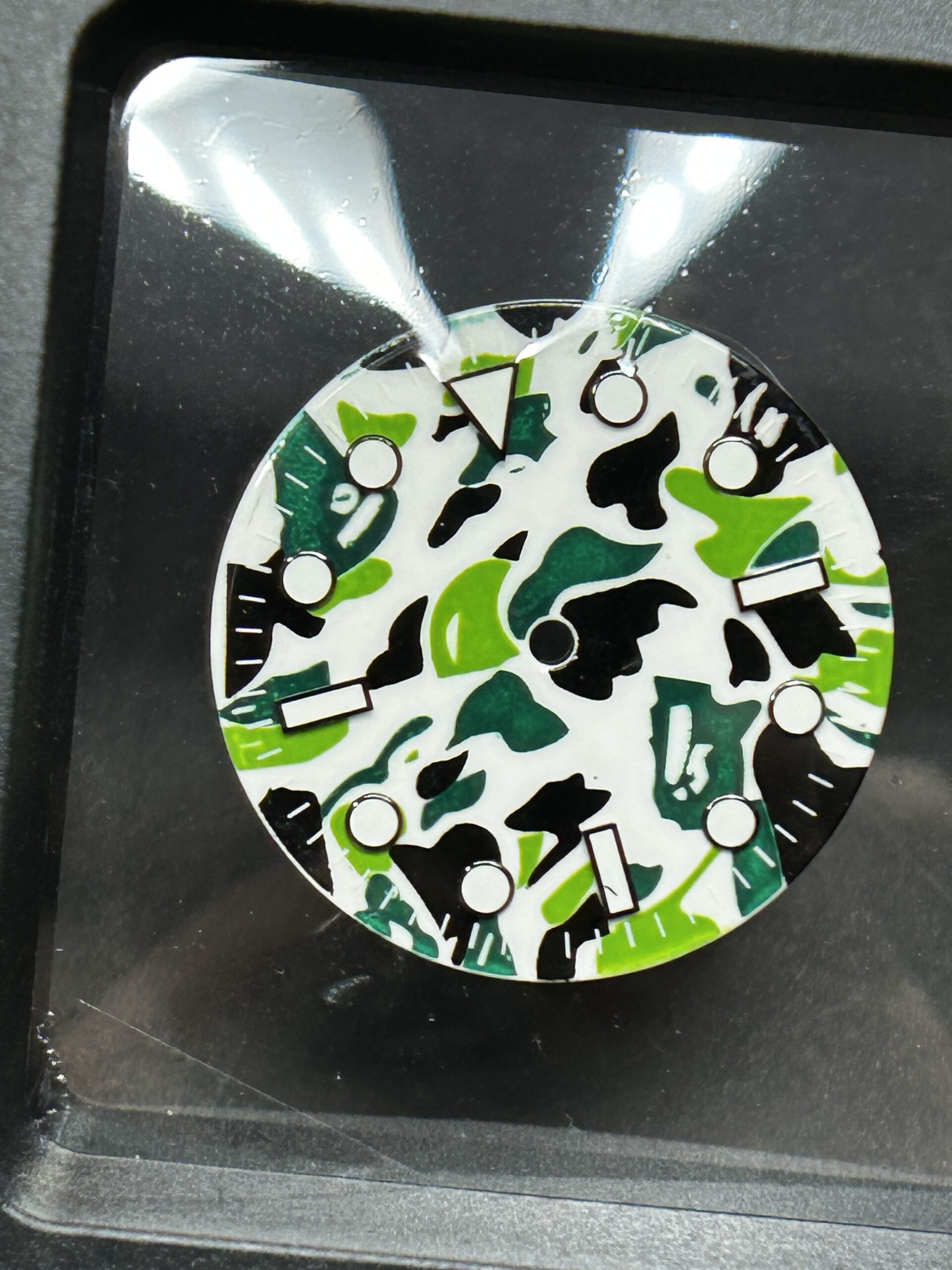 Green white camo dial.